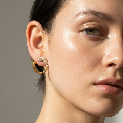 Tania Claire Australia Hera Hoops: twisted gold-plated stainless steel hoop earrings with pearl accents and stud closing.