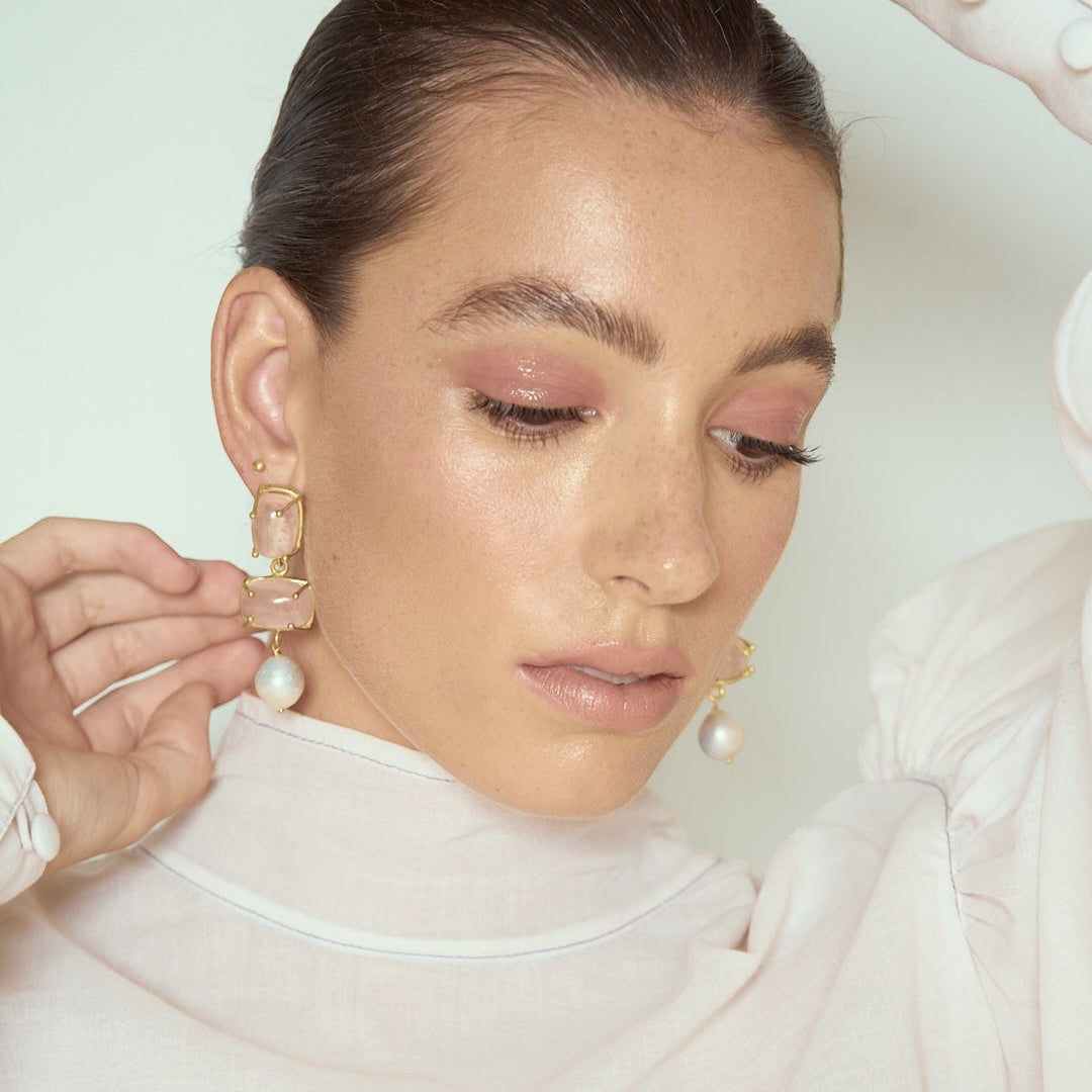 Tania Claire Australia Iris drop earrings featuring 24k gold-plated brass, pink gemstones, and white baroque pearls.