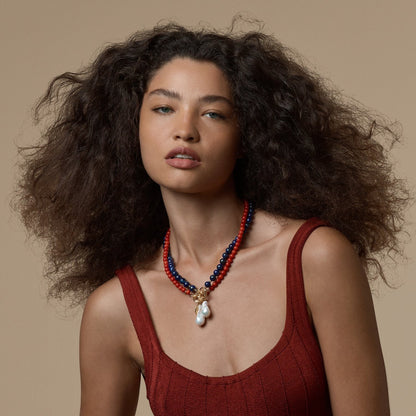 Tania Claire Australia Midnight Offering necklace with lapis lazuli, baroque pearls, and gold plating.