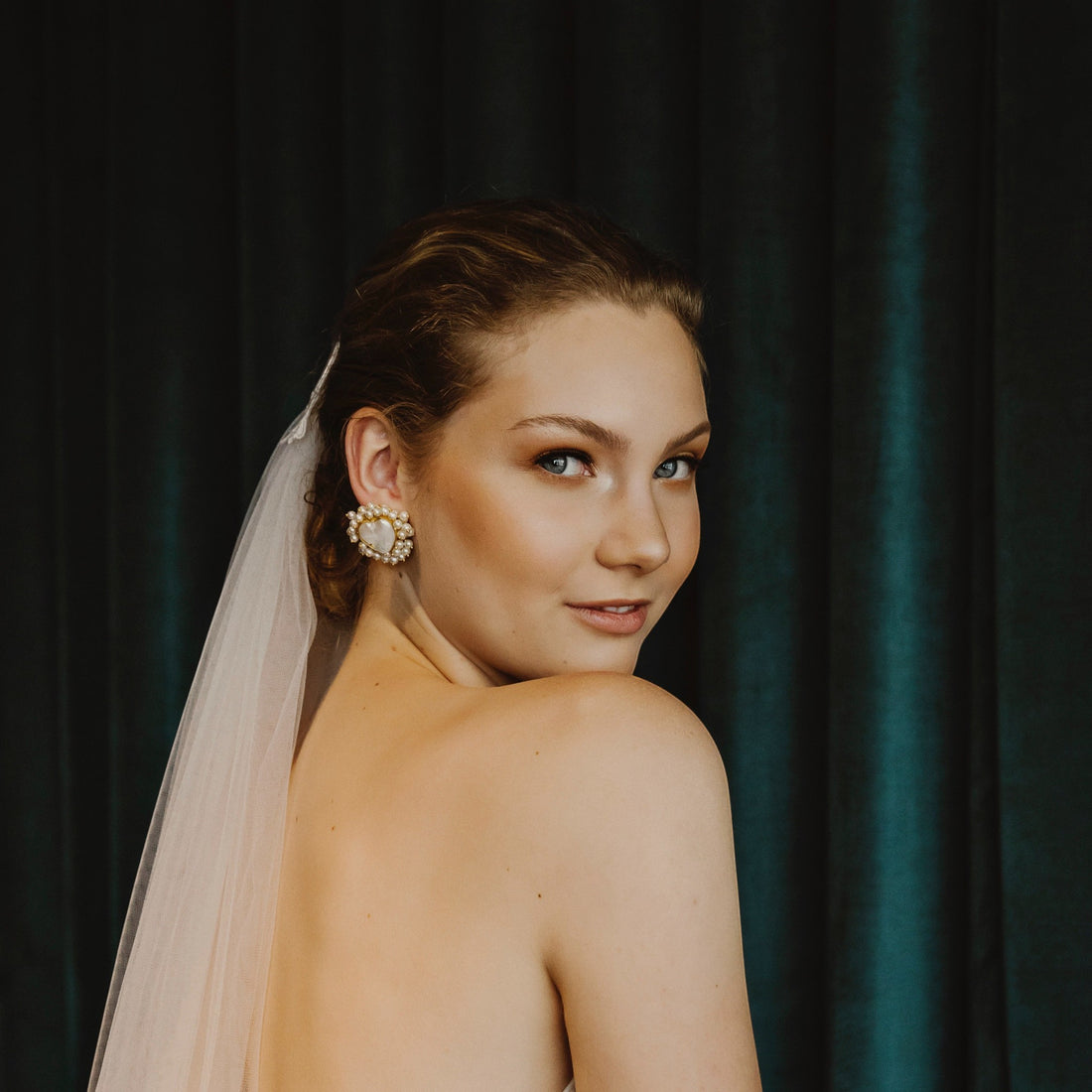 Tania Claire Australia Lucia baroque pearl stud earrings with freshwater seed pearl halo, gold-plated brass.