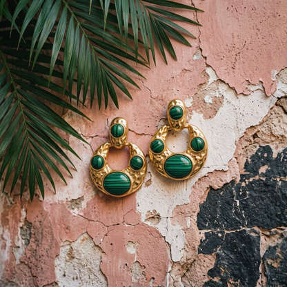Tania Claire Australia hammered gold crescent hoop earrings with banded green malachite cabochon stones.