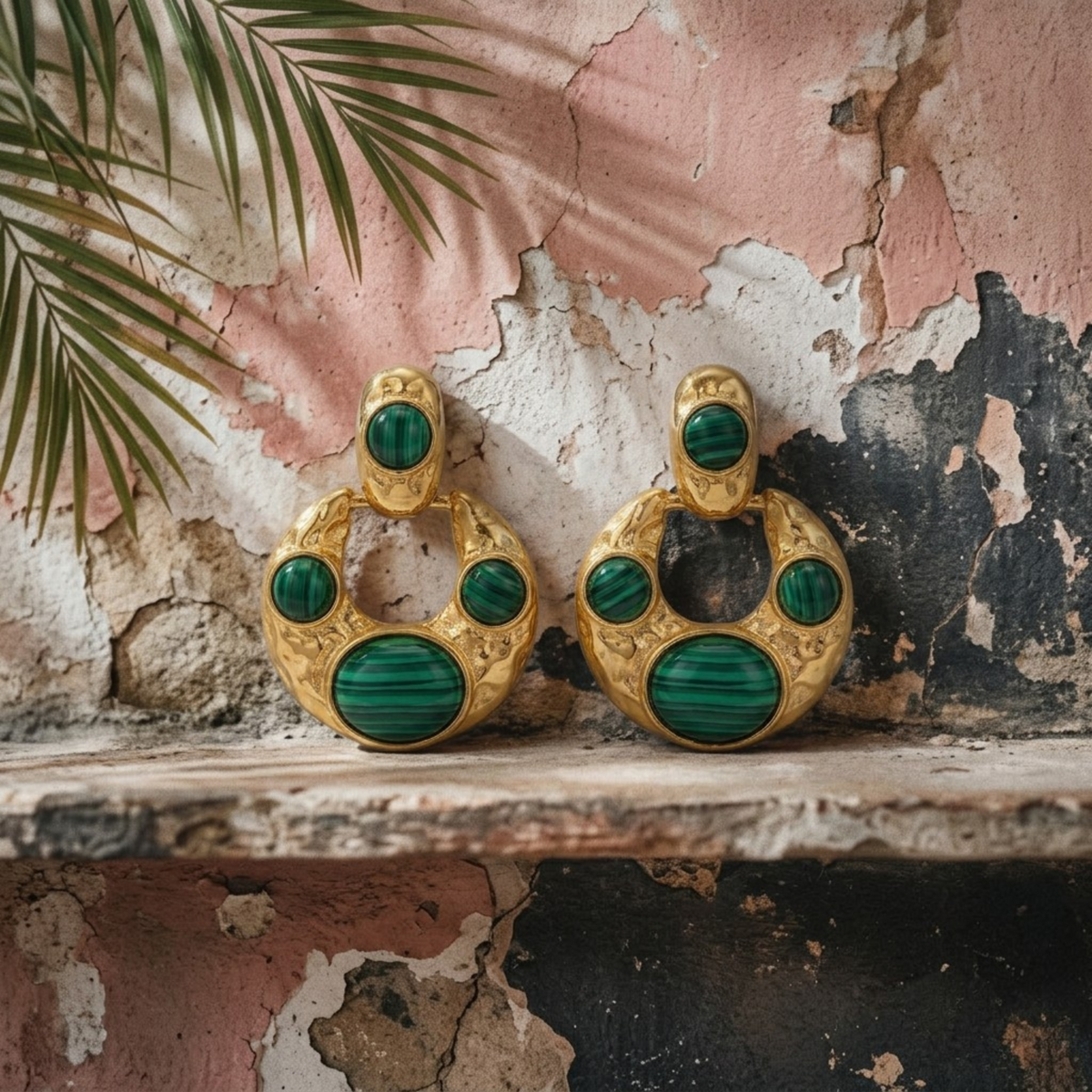 Tania Claire Australia hammered gold crescent hoop earrings with deep green banded malachite cabochon stones.