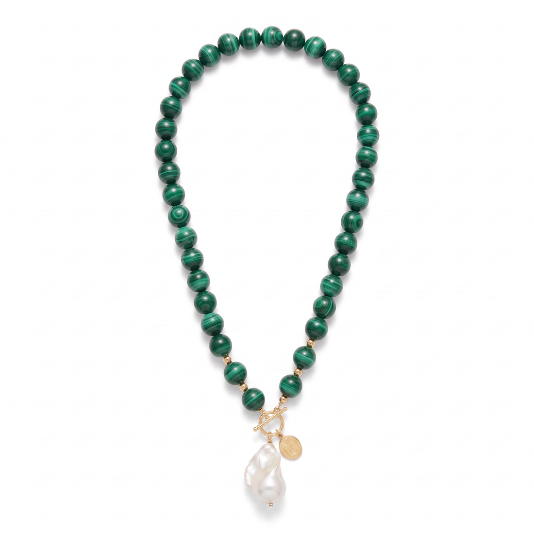 Tania Claire Australia Demeter necklace featuring green malachite beads, a baroque pearl, and a gold toggle clasp.