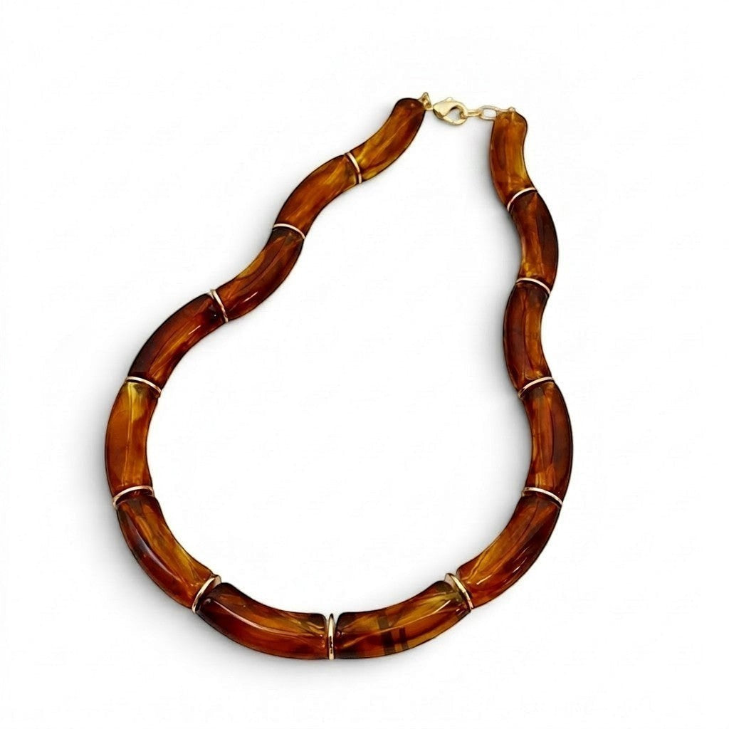 Tania Claire Australia Mia resin statement necklace featuring marbled brown beads with gold-tone spacers.