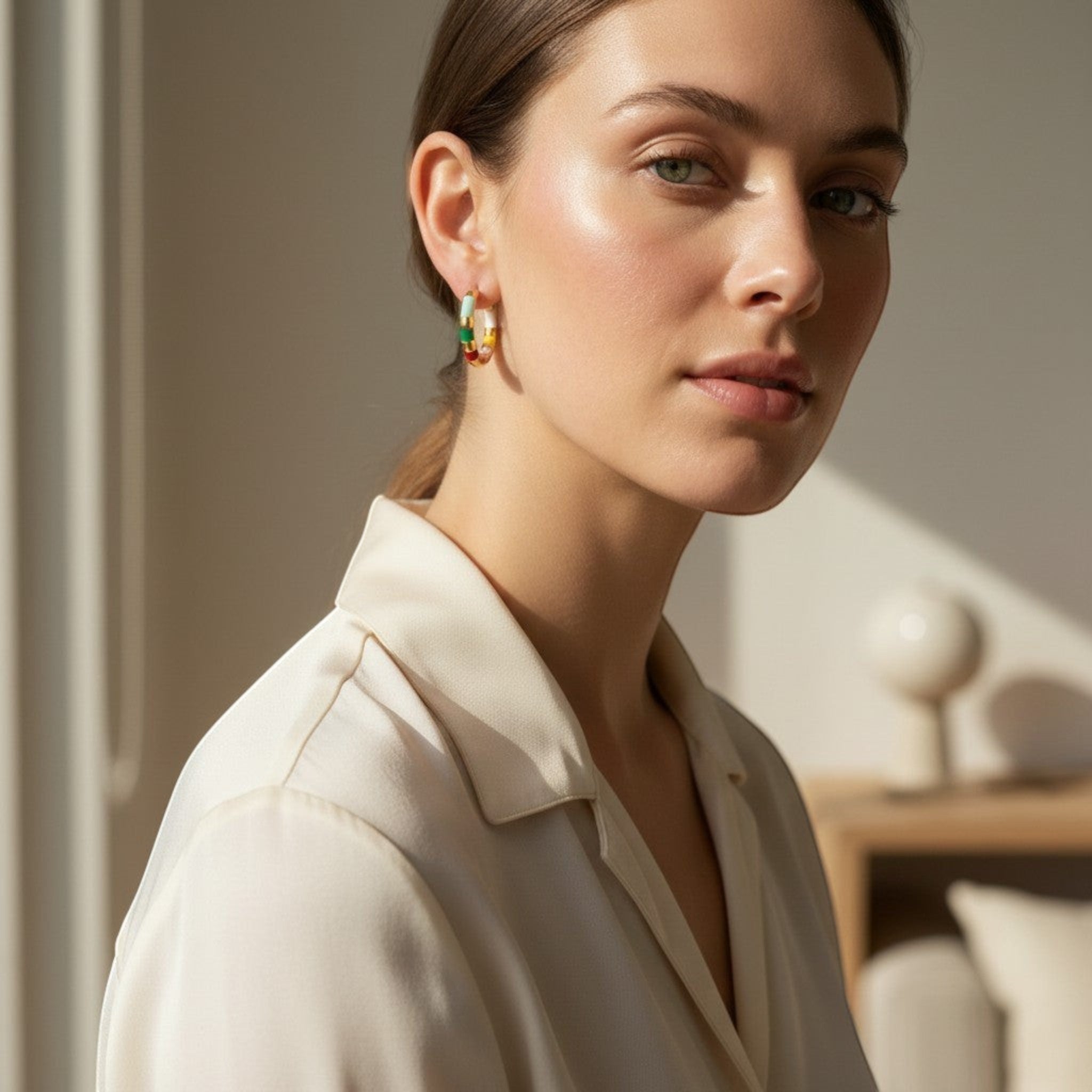 Tania Claire Australia Mini Confetti gold-plated hoop earrings with multi-colored enamel stripes.