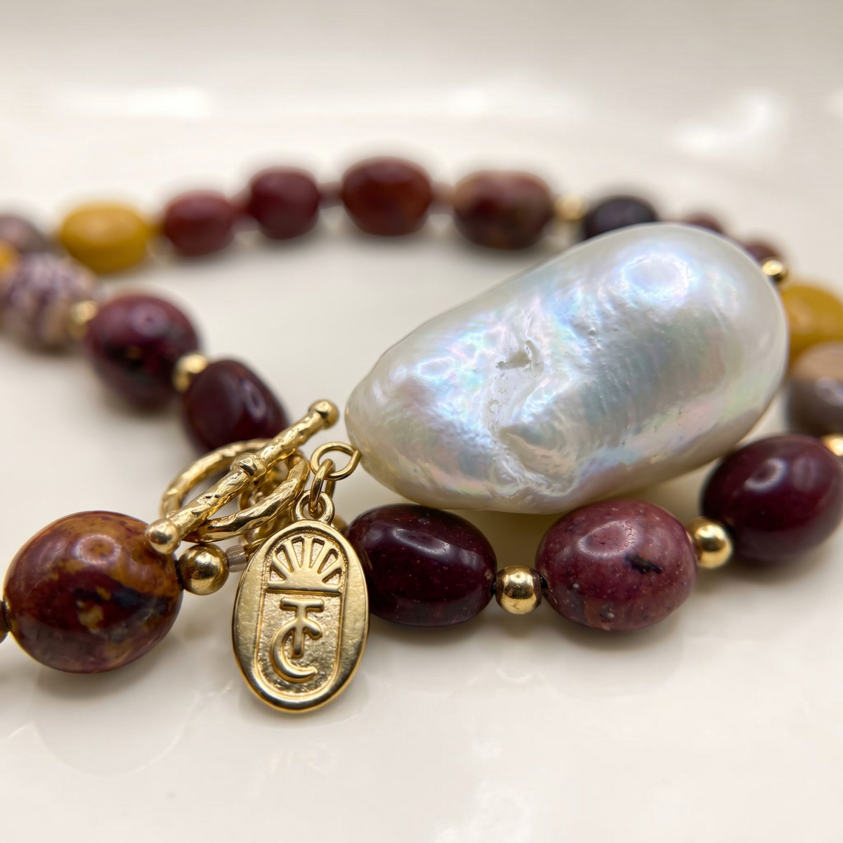 Tania Claire Australia Terra Lustre Necklace featuring multicoloured Mookaite jasper beads and a baroque pearl pendant.