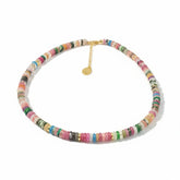 Tania Claire Australia multi-gemstone beaded necklace with gold extender chain. Features pink, green, blue, and neutral stones.