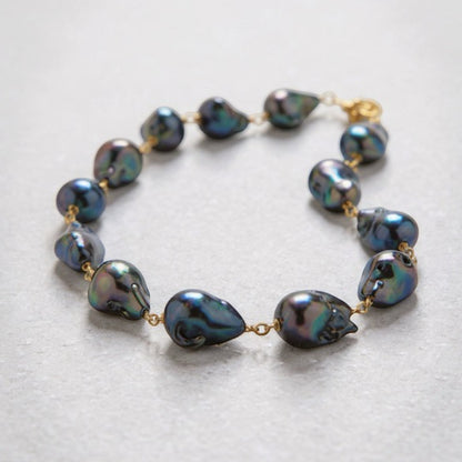 Tania Claire Australia Ocean Deep necklace with black Tahitian baroque pearls and 14k gold chain, 55cm length.