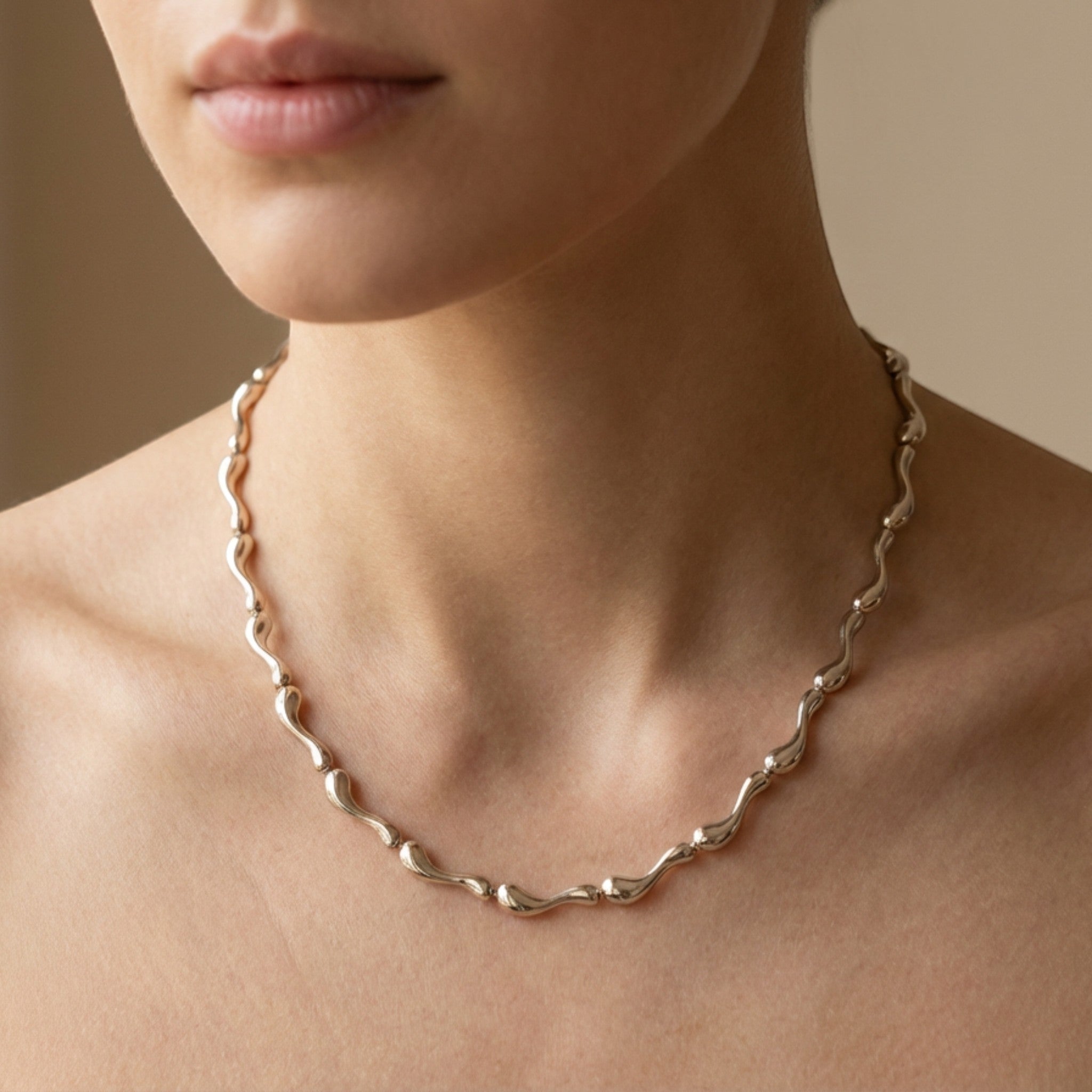Tania Claire Australia sterling silver Ocean Spine necklace with sculpted wave-like links.