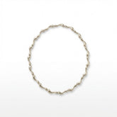 Tania Claire Australia Ocean Spine Necklace in sterling silver, featuring sculpted wave-like links for a fluid, coastal-inspired design.