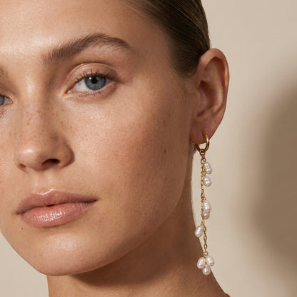 Tania Claire Australia Ondine Earrings: gold hoops with dangling freshwater pearls, 5cm length.