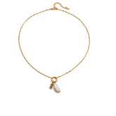 Tania Claire Australia gold plated stainless steel necklace featuring a lustrous pearl and a sparkling birthstone charm.