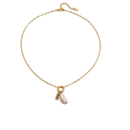 Tania Claire Australia gold plated stainless steel necklace featuring a lustrous pearl and a sparkling birthstone charm.