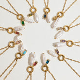 Tania Claire Australia gold plated stainless steel necklaces featuring lustrous baroque pearls and birthstone charms.