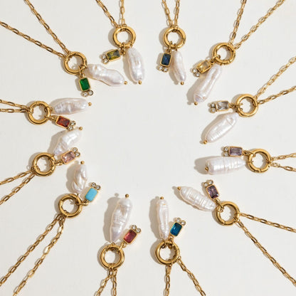 Tania Claire Australia gold plated stainless steel necklaces featuring lustrous baroque pearls and birthstone charms.