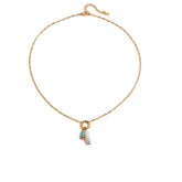 Tania Claire Australia gold plated stainless steel necklace featuring a lustrous pearl and a blue birthstone charm.