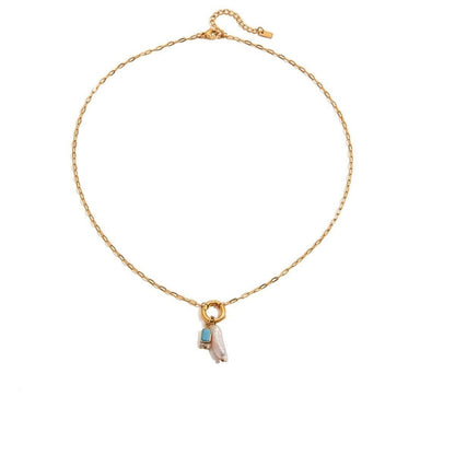 Tania Claire Australia gold plated stainless steel necklace featuring a lustrous pearl and a blue birthstone charm.