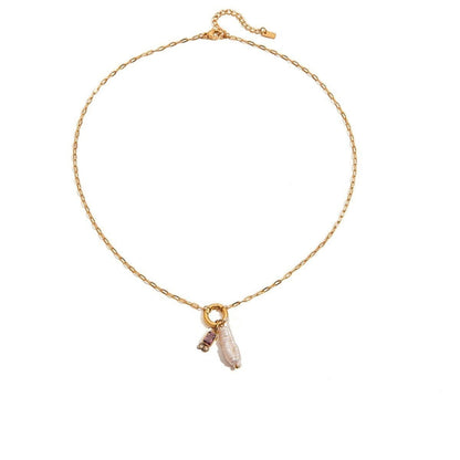 Tania Claire Australia gold plated stainless steel necklace featuring a lustrous pearl and purple birthstone charm.