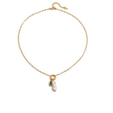Tania Claire Australia gold plated stainless steel necklace featuring a lustrous pearl and green birthstone charm.