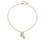 Tania Claire Australia gold-plated stainless steel necklace featuring a lustrous pearl and a sparkling birthstone gem.