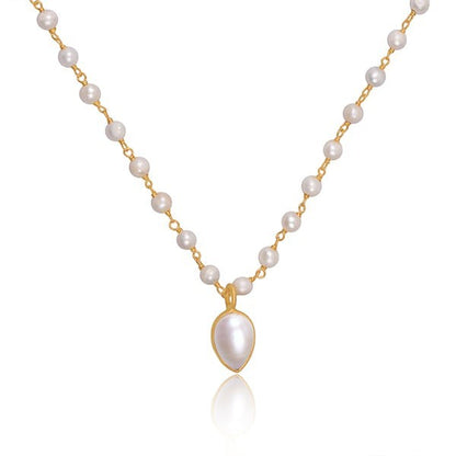 Tania Claire Australia 18K yellow gold plated sterling silver necklace with freshwater pearls and teardrop pendant.