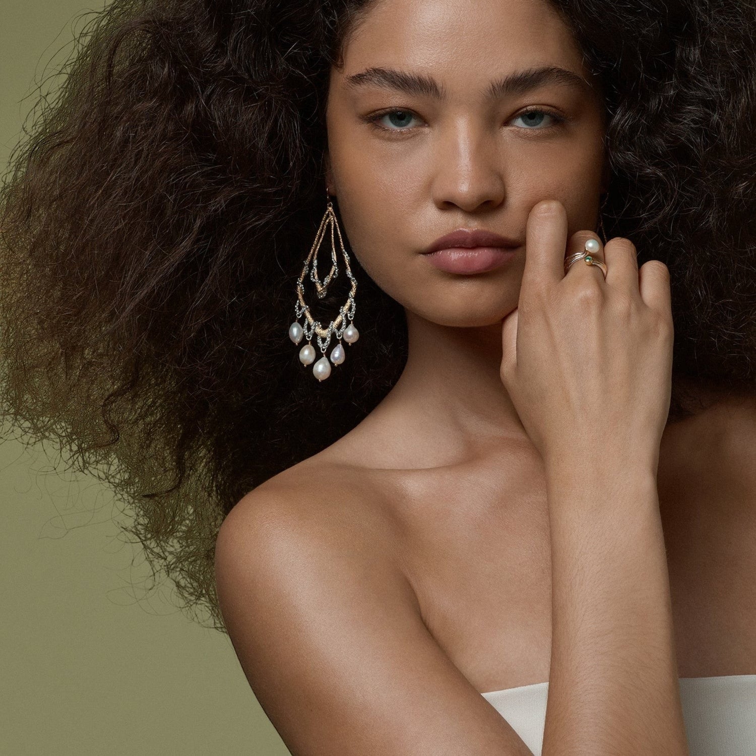 Tania Claire Australia Riverstone Ring: sterling silver band with 18k gold waves, freshwater pearl, and emerald.
