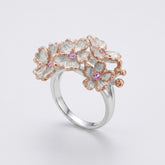 Tania Claire Australia Blossom Ring: sterling silver floral ring with rose gold accents and pink sapphires.