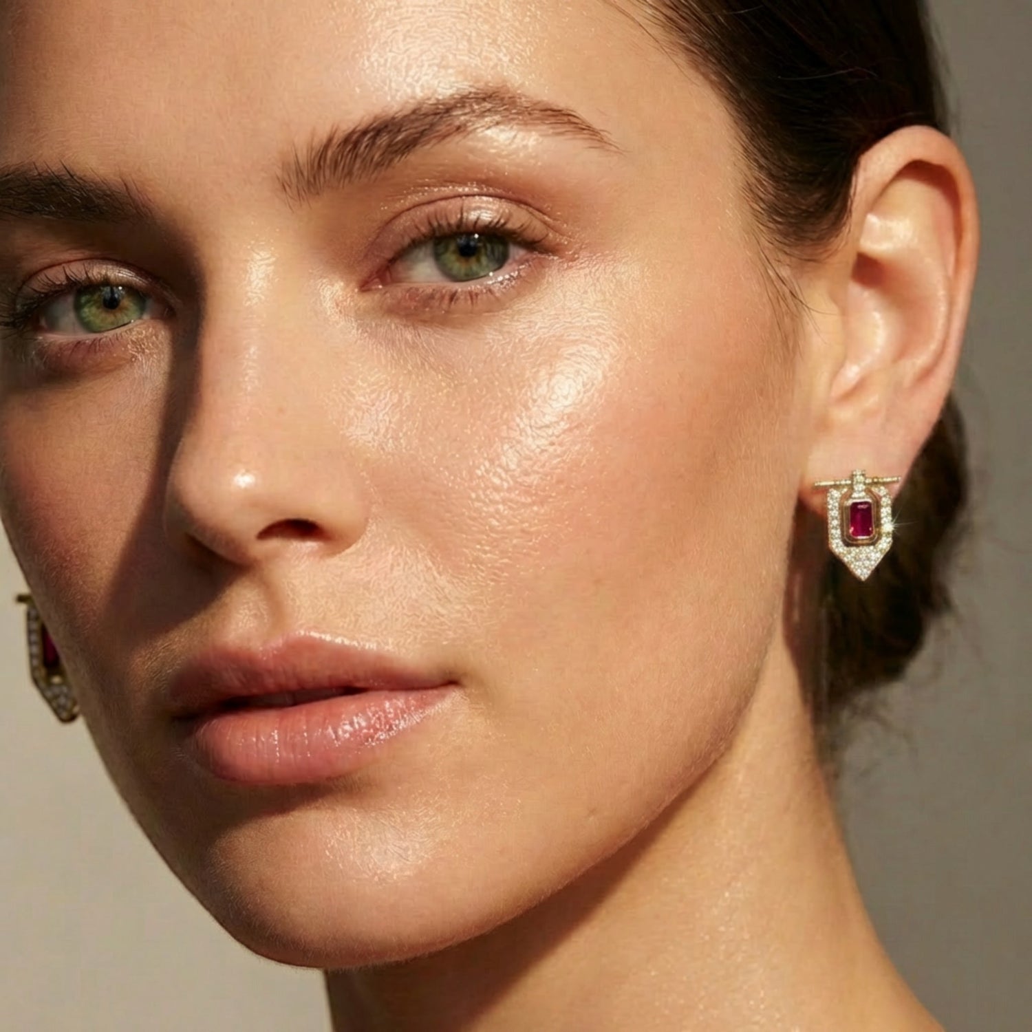 Tania Claire Australia Battleheart ruby and diamond shield stud earrings in gold.