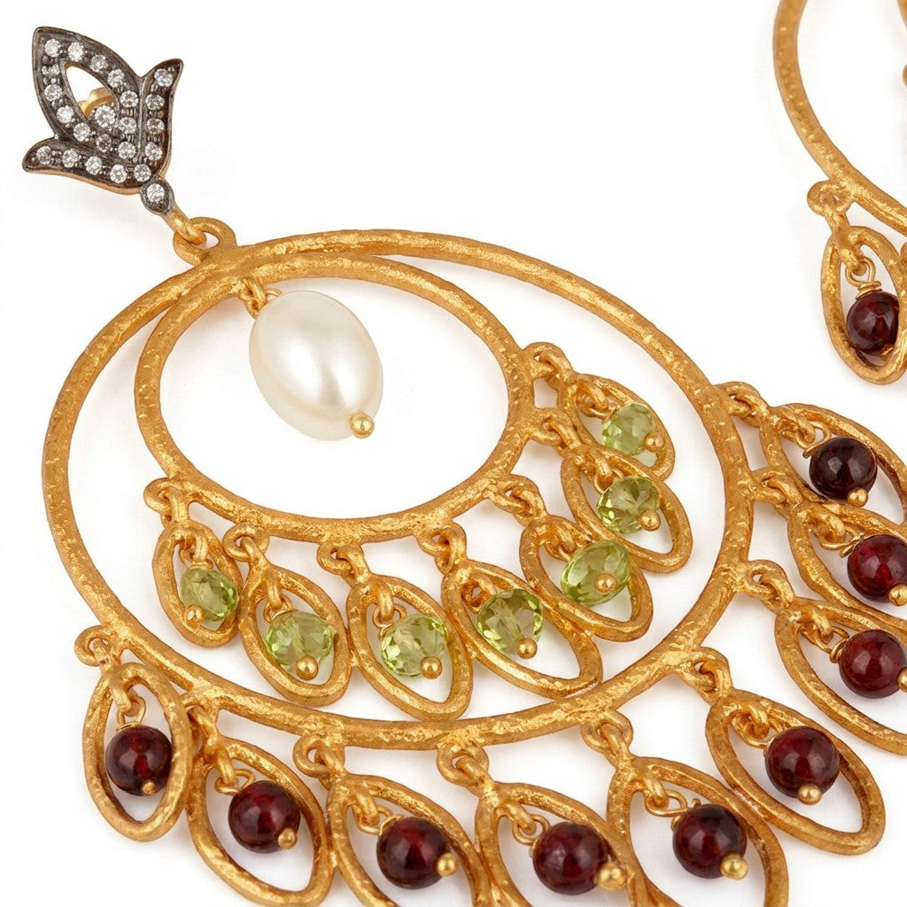 Tania Claire Australia Sacred Bloom gold-plated earrings with garnet, peridot, pearl, and crystal accents.