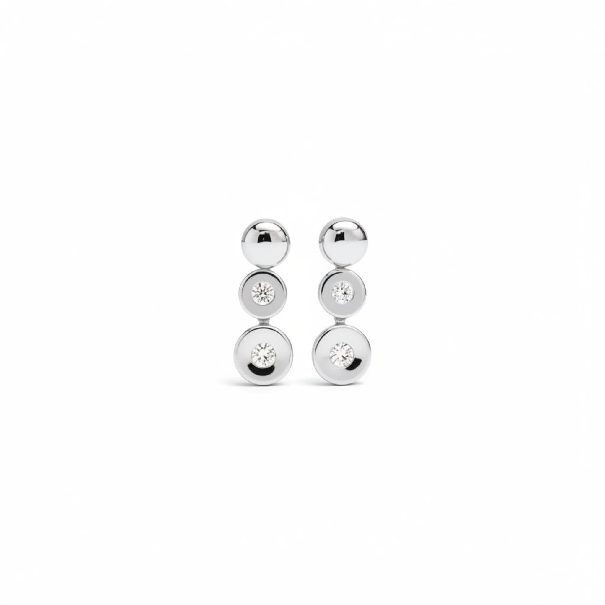 Tania Claire Australia Luna Trio Studs: Sterling silver 14k gold plated drop earrings with three stacked polished orbs and cubic zirconia accents.