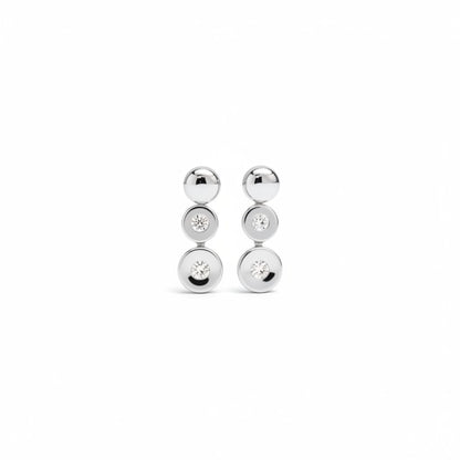 Tania Claire Australia Luna Trio Studs: Sterling silver 14k gold plated drop earrings with three stacked polished orbs and cubic zirconia accents.