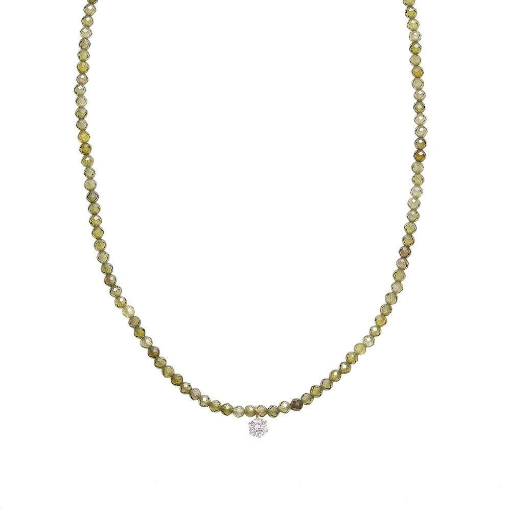 A gold-colored necklace with small clear crystals and a clear crystal pendant, measuring 40cm in length.