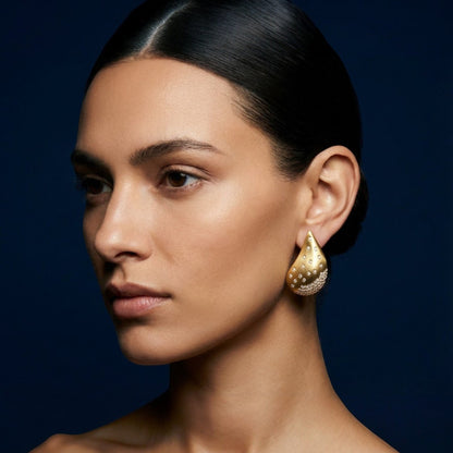 Tania Claire Australia Stella Drift teardrop gold-tone earrings with crystal pavé accents and stud fitting.