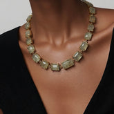 Tania Claire Australia Theia necklace with 18K gold-plated brass and light green gemstones. Length 37cm.