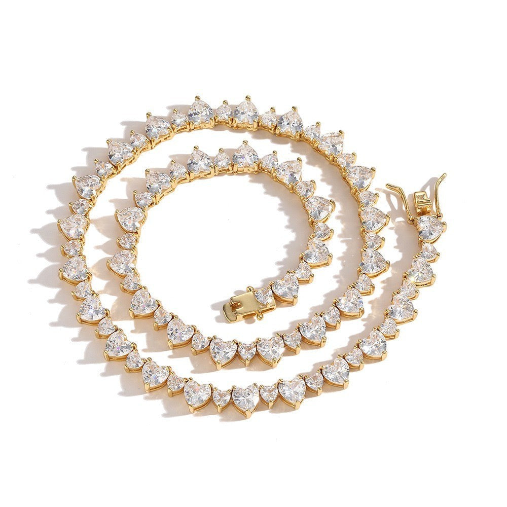 Tania Claire Australia Venus Necklace, gold-plated brass with heart-shaped cubic zirconia stones.