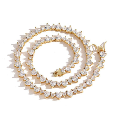 Tania Claire Australia Venus Necklace, gold-plated brass with heart-shaped cubic zirconia stones.