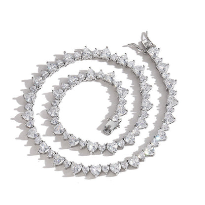 Tania Claire Australia Venus Necklace with heart-shaped cubic zirconia stones and 18K gold-plated brass.