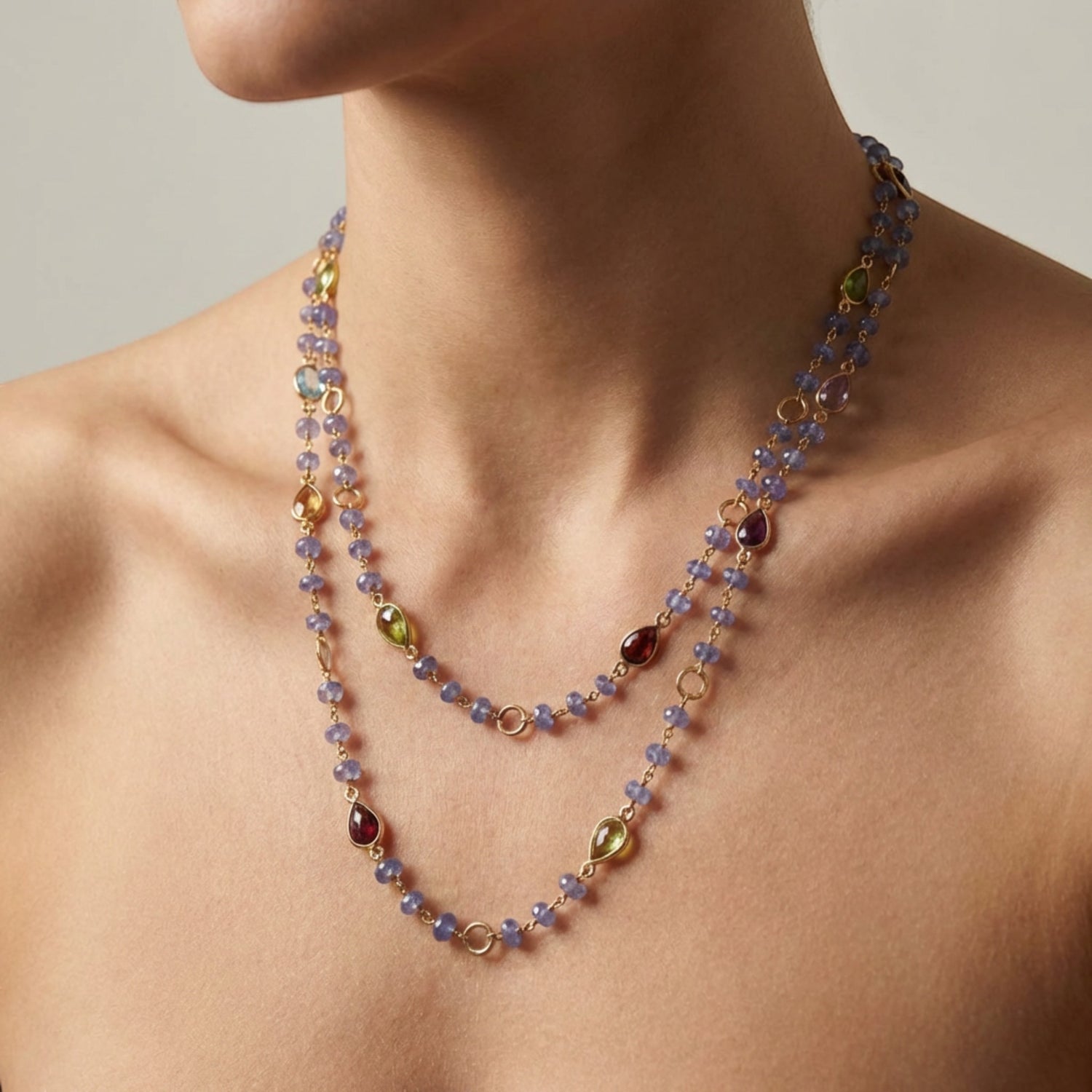 Tania Claire Australia Violet Grove Necklace with gold chain, amethyst, citrine, peridot, blue topaz, garnet, and tanzanite beads.