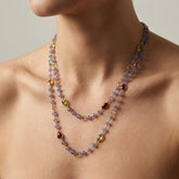 Tania Claire Australia Violet Grove Necklace with gold chain, amethyst, citrine, peridot, blue topaz, garnet, and tanzanite beads.