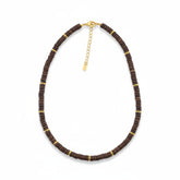 Tania Claire Australia dark brown wood bead necklace with gold accents and extender chain.