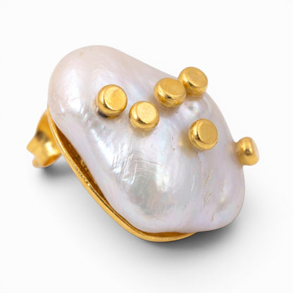 Tania Claire Australia Tide Mark baroque pearl earrings with gold-tone studs. Unique organic shape, iridescent white pearl.