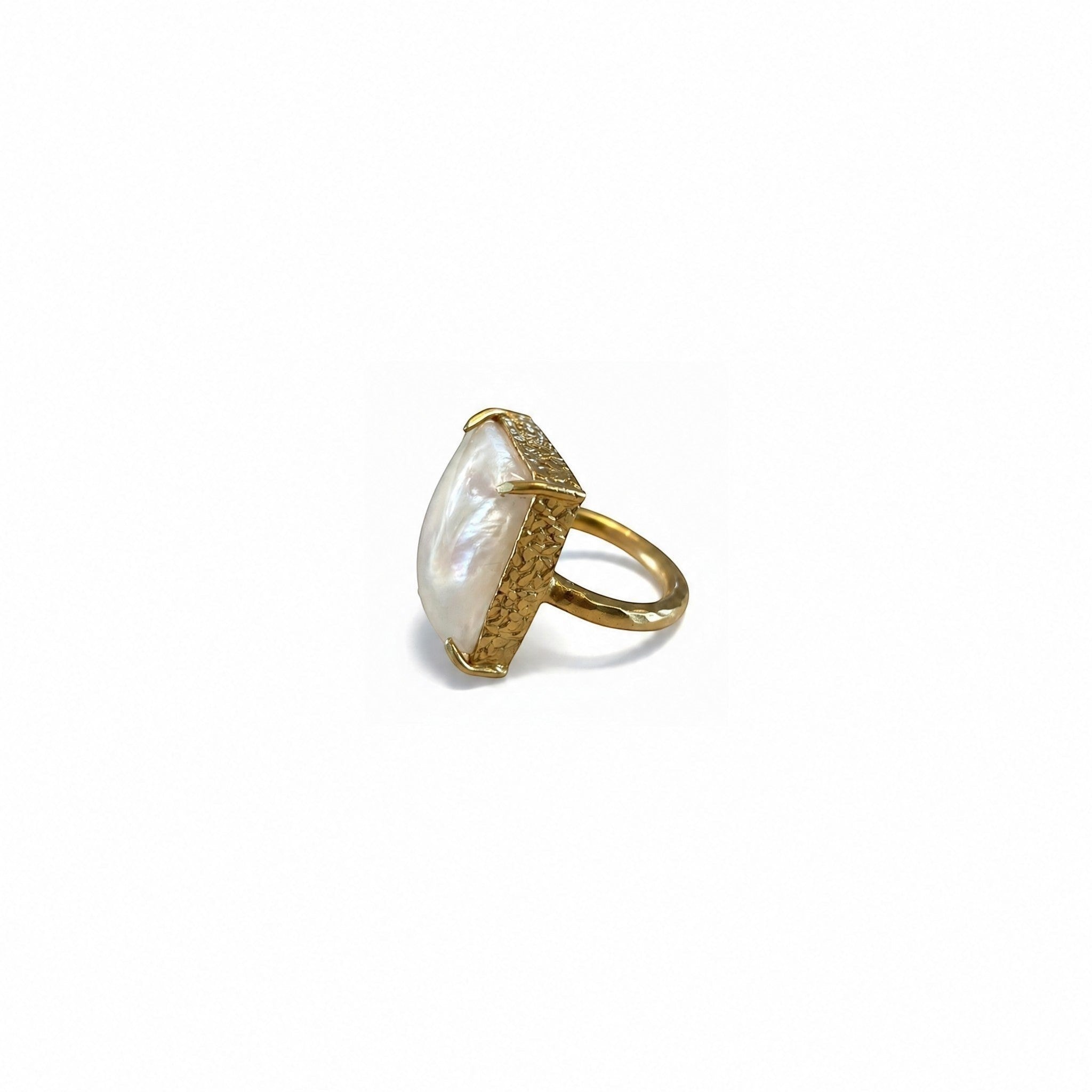Tania Claire Australia Cleo Gemstone Ring with a large, iridescent white gemstone in a gold-tone prong setting.
