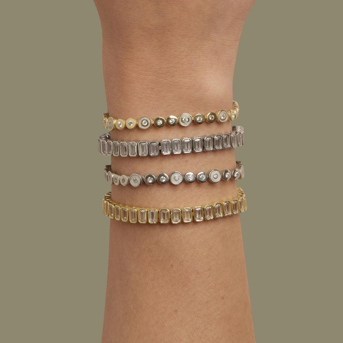 Tania Claire Australia Elara Bracelet: gold and silver bracelets with circular links and shimmering stones, and rectangular links with clear stones.