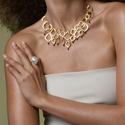 Tania Claire Australia gold wave ring with baroque pearl, 14K gold plated brass.