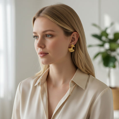 Tania Claire Australia gold dipped stainless steel bell drop stud earrings with textured detail.