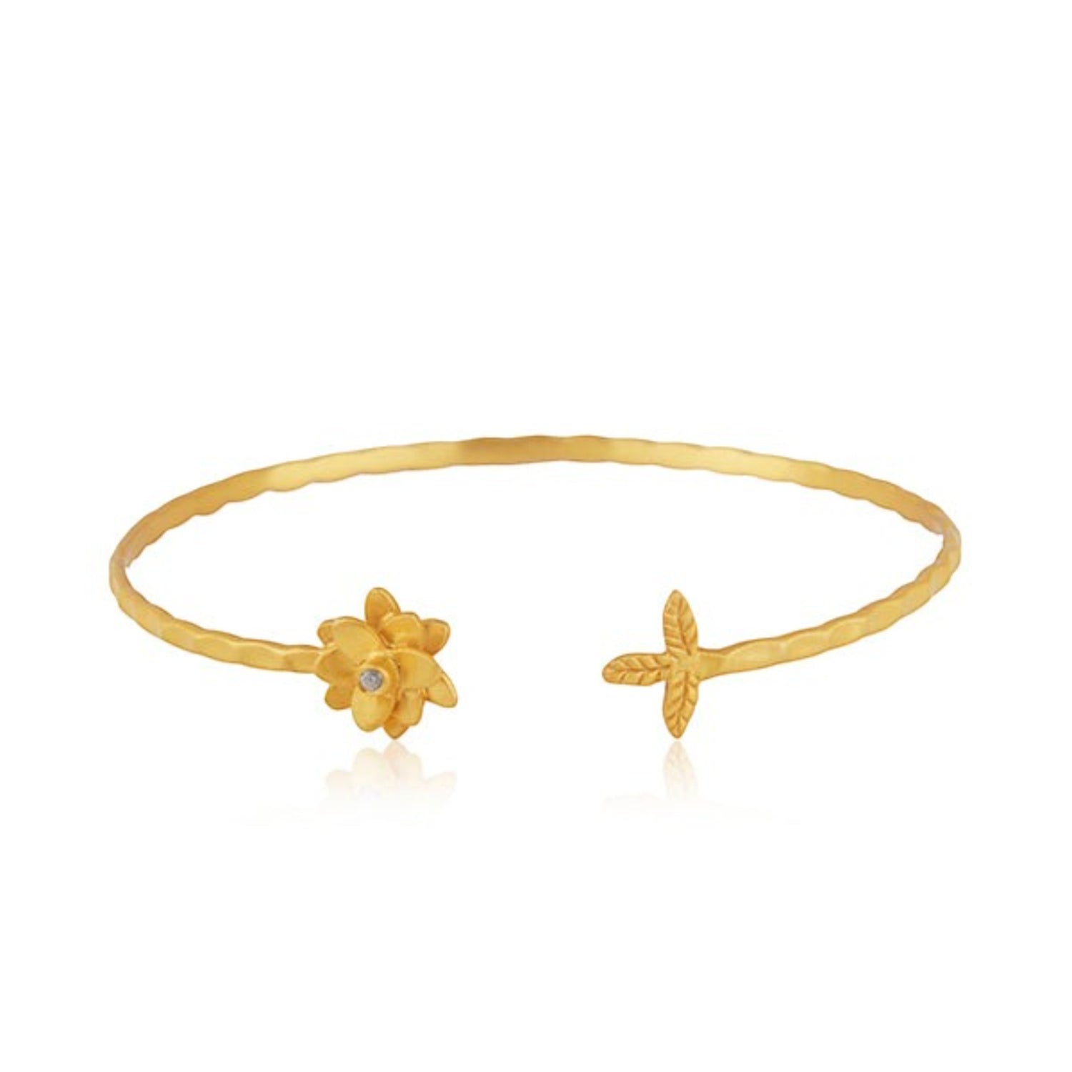 Tania Claire Australia Petal Thorn Cuff, hammered gold cuff bracelet with a floral design, a single crystal, and a leaf accent.